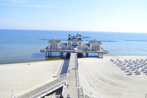 a house on a pier on the beach at Ferienwohnungen Göhren in Göhren