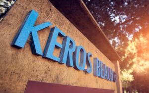 a krods bank sign on the side of a building at Keros Blue - Luxury in Wilderness in Kalliópi