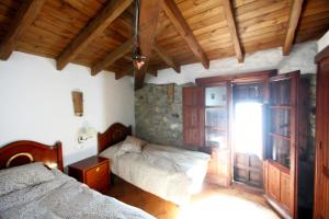 Posteľ alebo postele v izbe v ubytovaní Casa Rural en Grazalema + 36 fotografií