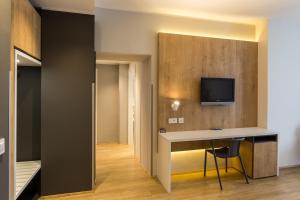 TV a/nebo společenská místnost v ubytování M Hotel