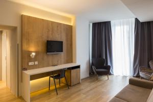 TV a/nebo společenská místnost v ubytování M Hotel