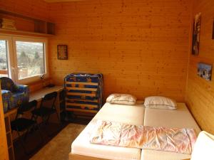 Postel nebo postele na pokoji v ubytování Chalupa U Vinaře
