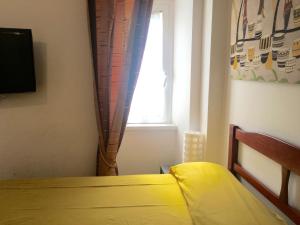 Posteľ alebo postele v izbe v ubytovaní Doria Suites