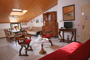 Μια τηλεόραση ή/και κέντρο ψυχαγωγίας στο Agriturismo VILLA MOZART nel verde