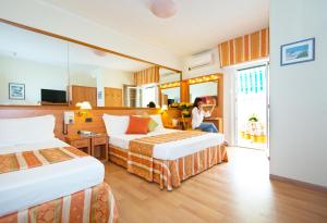 Postel nebo postele na pokoji v ubytování Hotel Al Prater + 37 fotografií