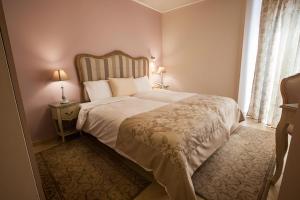 Katil atau katil-katil dalam bilik di Hotel Marianna