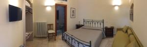 Postel nebo postele na pokoji v ubytování B&B San Potito