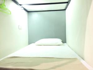 Postel nebo postele na pokoji v ubytování Sunset Homestay - Backpacker Hostel Self Checkin