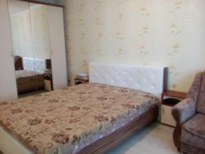 Кровать или кровати в номере Apartment on Lenina 73