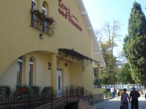 a building with a sign on the side of it at Casa Veronica in Baile Felix