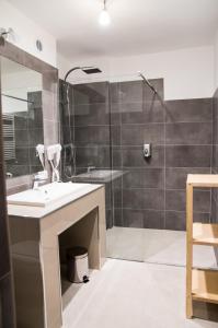 Kúpeľňa v ubytovaní Apartamenty Maria