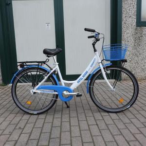 two bikes parked in front of a building at Hotel Sogno in Cesenatico