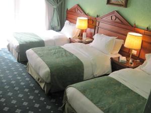 Voodi või voodid majutusasutuse Serenada Golden Palace - Boutique Hotel toas