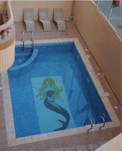 Piscina a Gulf Continental Suite o a prop