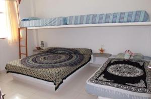 Двуетажно легло или двуетажни легла в стая в Casa Gonzales Gonzales