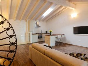 A television and/or entertainment centre at Les Suites