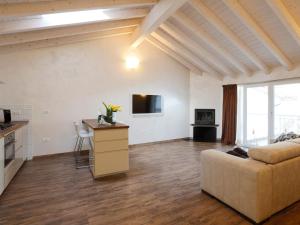 A television and/or entertainment centre at Les Suites