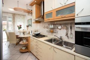 Apartment Luce tesisinde mutfak veya mini mutfak