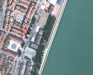 an aerial view of a city next to the water at Hostal Rodes in Mequinenza