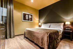 Hotel Nord 1901客房内的一张或多张床位