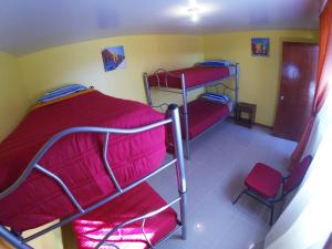 Giường trong phòng chung tại Casa TINY