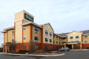 a hotel building with a sign on top of it at Extended Stay America Select Suites - Chicago - Hanover Park in Hanover Park