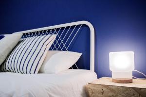 Postel nebo postele na pokoji v ubytování B&B El Mercat