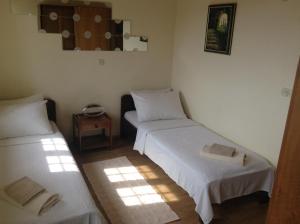 Postel nebo postele na pokoji v ubytování Apartments Bianki