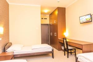 Postel nebo postele na pokoji v ubytování Hotel Drinska lasta