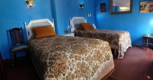 Postelja oz. postelje v sobi nastanitve Hotel Riad Dalia Tetouan