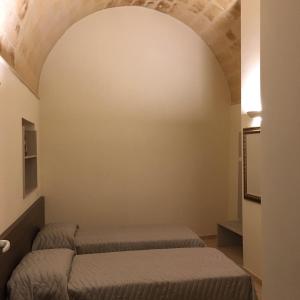 Postel nebo postele na pokoji v ubytování B&B San Potito