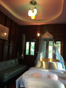 Cama o camas de una habitación en Panpim Resort