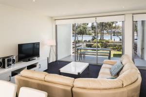 TV a/nebo společenská místnost v ubytování Coast Resort Merimbula