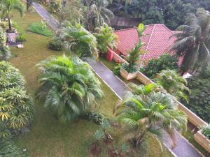 an aerial view of a house with palm trees at DSR Apartment Margonda Residence 2 in Depok