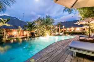an image of a swimming pool at a villa at Wayang Retreat in Canggu