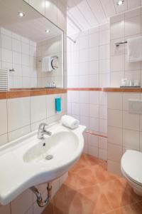 Koupelna v ubytování Hotel Isartor