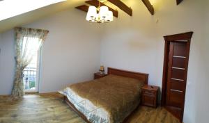 Ένα ή περισσότερα κρεβάτια σε δωμάτιο στο Apartament Smilčių skg