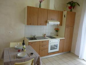 Kuchyň nebo kuchyňský kout v ubytování Residence Costablu