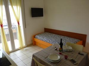 Postel nebo postele na pokoji v ubytování Residence Costablu