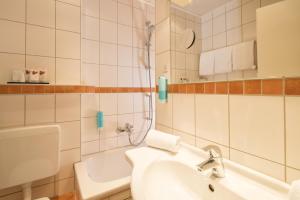 Koupelna v ubytování Hotel Isartor