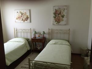 Postel nebo postele na pokoji v ubytování Le Tre Querce B&B