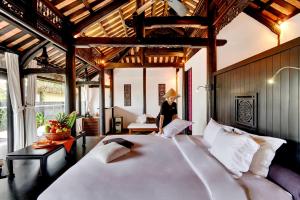 Postel nebo postele na pokoji v ubytování Chen Sea Resort & Spa Phu Quoc