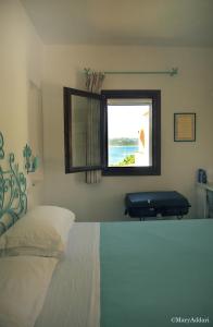 Katil atau katil-katil dalam bilik di Hotel Villa Gemella