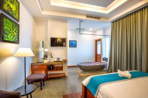 Voodi või voodid majutusasutuse The Tito Suite Residence toas