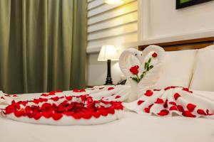 Voodi või voodid majutusasutuse The Tito Suite Residence toas
