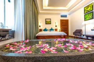 Voodi või voodid majutusasutuse The Tito Suite Residence toas