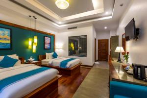 Voodi või voodid majutusasutuse The Tito Suite Residence toas