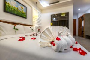 Voodi või voodid majutusasutuse The Tito Suite Residence toas