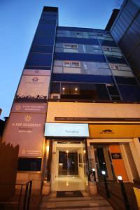 a tall building with a door in front of it at K-POP Residence Myeongdong 1 in Seoul