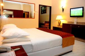 Cama ou camas em um quarto em Hotel Summersands